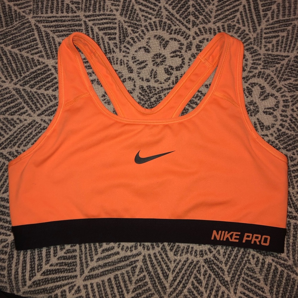 neon orange nike sports bra